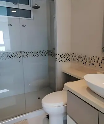 a bathroom with a white toilet and a sink at Luxury 2B apartment, Amazing View in Cartagena de Indias