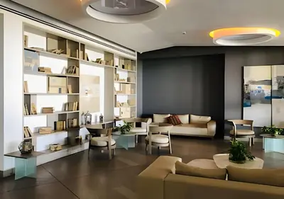 a living room with a couch and a table and chairs at Breathtaking ocean view, central location in Cartagena de Indias