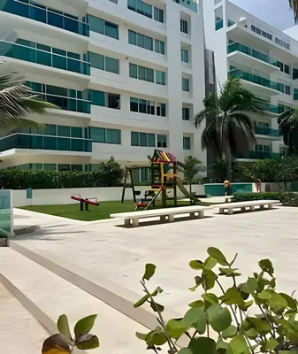 a playground in front of a building at Lindo apto con salida directa a la playa in Cartagena de Indias