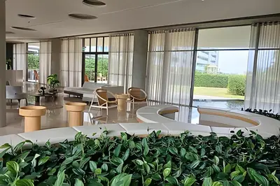 a lobby with a bunch of potted plants at Lujo y privacidad, Vista y salida directa al mar in Cartagena de Indias