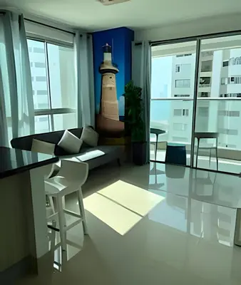 a living room with a lighthouse on the wall at Coastal Charm with Mesmerizing Seaside Views in Cartagena de Indias