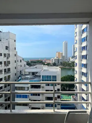 a view of a city from a balcony of a building at Bello apartamento con acceso directo a la playa in Cartagena de Indias