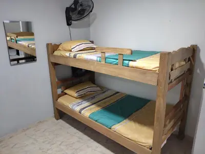 two sets of bunk beds in a room at Backhouse gallery in Cartagena de Indias