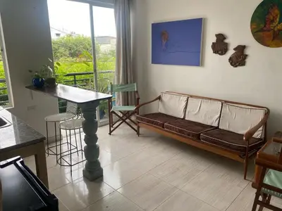 a living room with a couch and a table at Northwest Hostings 4 in Cartagena de Indias