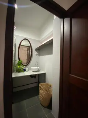 a bathroom with a sink and a mirror at Northwest Hostings 4 in Cartagena de Indias