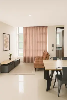 a living room with a couch and a table at Apto Grand- Ithiel in Barranquilla