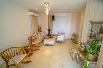a living room with a couch and chairs at Casa Chongui in Lorica
