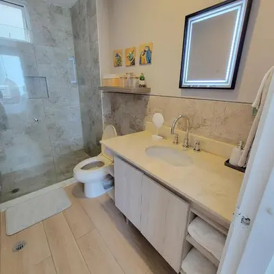 a bathroom with a sink and a toilet and a shower at View, exit to Playa Morros tres Cartagena in Cartagena de Indias