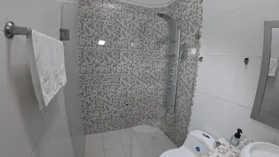 a bathroom with a shower and a toilet at Casa cerca al mar Zona Norte Cielo Mar Cartagena in Cartagena de Indias