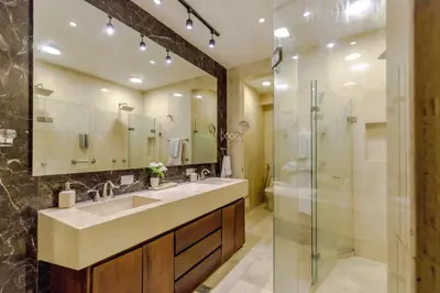 a bathroom with a sink and a shower at Estrella de San Pedro B&B in Cartagena de Indias