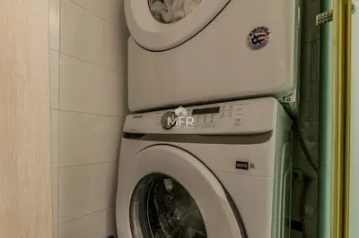 a washer and dryer in a corner of a room at Morros 3, 1 Bedroom & Seaview in Cartagena de Indias