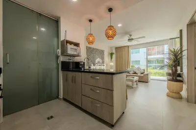 a kitchen with a sink and a microwave at Morros 3, 1 Bedroom & Seaview in Cartagena de Indias