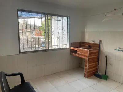 an empty room with a sink and a window at Posada Encanto Cartagena in Cartagena de Indias
