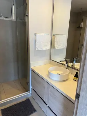 a bathroom with a sink and a shower at Cartagena Serena del mar Morros IO in Cartagena de Indias