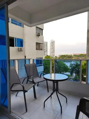 a balcony with a table and chairs and a view at Apartamento con vista al Laguito, Nuevo Conquistador in Cartagena de Indias