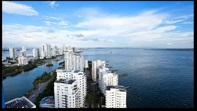 an aerial view of a city with water and buildings at Oceanview Suite with two Pools, Gym & Guest Access in Cartagena de Indias