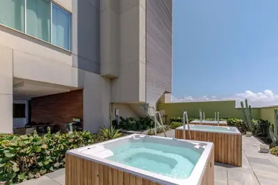 a hot tub on the patio of a building at Moderno Apartamento 1504 in Cartagena de Indias