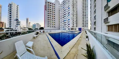 a swimming pool on a balcony of a building at Apartamento playa Bocagrande Los Delfines Cartagena in Cartagena de Indias