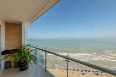 a balcony with a view of the beach at The best Luxury Suite in Cartagena in Cartagena de Indias