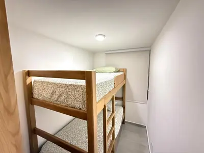 a bunk bed room with two bunk beds at APTO LODGE - Confortable y acogedor apartamento al norte de Barranquilla vía a Puerto Colombia in Barranquilla