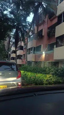a car is parked in front of a building at Isabela House in Barranquilla