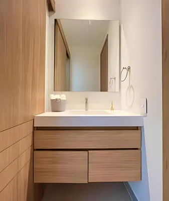 a bathroom with a sink and a mirror at Vista a Laguna de Kristal + Bote inflable in Los Arrayanes