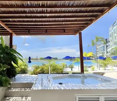 a view from the pool at the resort at Vista a Laguna de Kristal + Bote inflable in Los Arrayanes