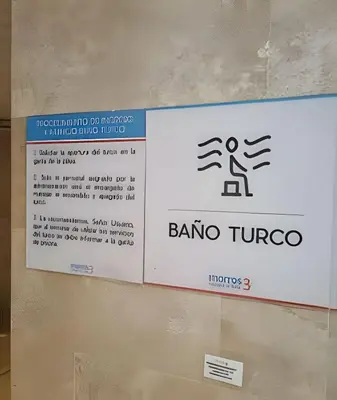 a sign on a wall with a sign for a baro turnover at 1 Dormitorio y terraza Morros. Vista mar in Cartagena de Indias