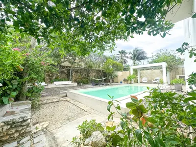 a swimming pool in the backyard of a house at Apartment for 6 Guests in Sabanilla a Few Steps from the Sea in Maizal