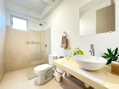 a bathroom with a sink and a toilet and a shower at Apartment for 6 Guests in Sabanilla a Few Steps from the Sea in Maizal