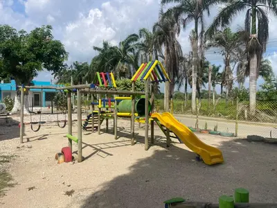 a playground with a slide and slidesktop at Habitaciones Melany in Coveñas