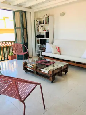 a living room with a coffee table and a couch at Cartagena - stunning location in walled city in Cartagena de Indias