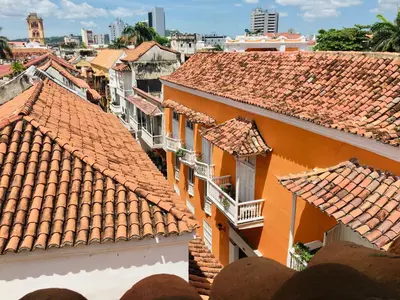 an overhead view of roofs of buildings in a city at Cartagena - stunning location in walled city in Cartagena de Indias