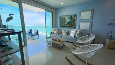 a living room with a couch and chairs at Magico Apartamento Frente al Mar 3 Habitaciones AR134 in Coveñas