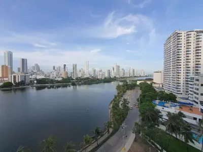 a view of a city with a river and buildings at Moderna suite con balcón y vista al lago y al mar in Cartagena de Indias