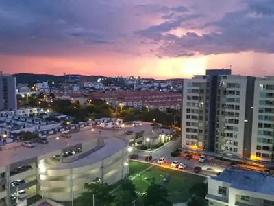 a view of a city at night at Duplex Penthouse Rooftop Lounge in Barranquilla
