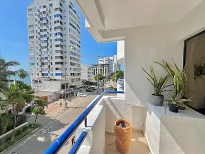 a balcony with a view of a street and a building at Luxury mediterranean Suite in Cartagena de Indias
