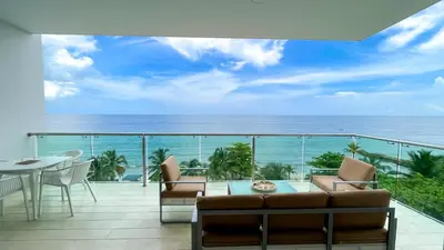 a balcony with a view of the ocean at Magico Apartamento Frente al Mar 3 Habitaciones TR52 in Coveñitas