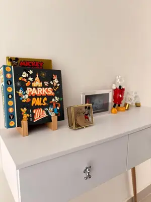 a white shelf with some toys and a picture at Exclusive apartment with ocean view in Cartagena de Indias