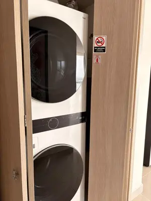 a microwave oven sitting inside of a door at Exclusive apartment with ocean view in Cartagena de Indias