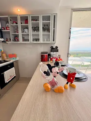 two stuffed animals are sitting on the counter in a kitchen at Exclusive apartment with ocean view in Cartagena de Indias