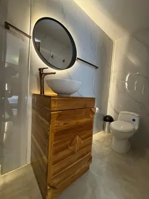a bathroom with a sink and a mirror on a vanity at Habitaciones luxury baru in Playa Blanca