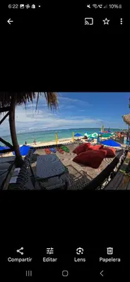 a screen shot of a beach with a view at Hostal Ananda in Playa Blanca