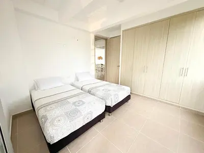 a bedroom with two beds and cabinets in it at Apartment for 4 Guests in Sabanilla a few steps from the sea in Maizal