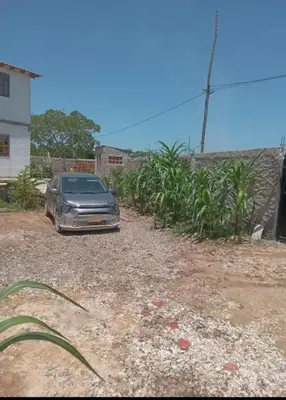a car parked in the driveway of a house at Cabaña Barbacoas1 in Santa Ana