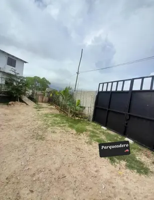 a fence with a sign that reads patriarchy at Cabaña Barbacoas1 in Santa Ana