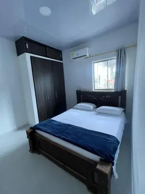 a bedroom with a bed and a window at Apartamento Salome in Coveñitas