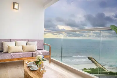 a living room with a view of the ocean at Ocean View ApartaSuite 16th Floor in Cartagena de Indias