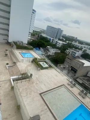 an overhead view of a swimming pool on top of a building at Moderno Apto cerca del Mar y Aeropuerto in Cartagena de Indias