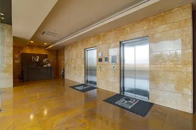 a hallway with two elevators in a building at Luxury Ocean View Apartment Building H2 - Hyatt in Cartagena de Indias